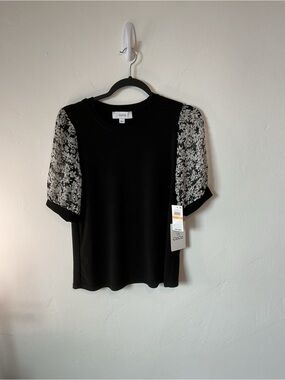 CeCe Black Top with White Floral Mesh Puff Sleeves